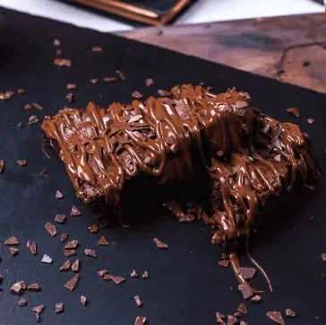 Cheesy garlic bread fresh out of the oven at Nexus Café